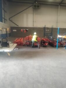 Papa Professional Removals team member handling items during a warehouse move